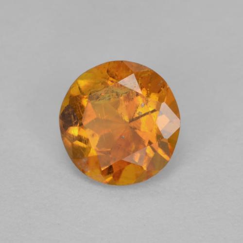 Clinohumita naranja medio natural de 0,63 ct, corte redondo, SI