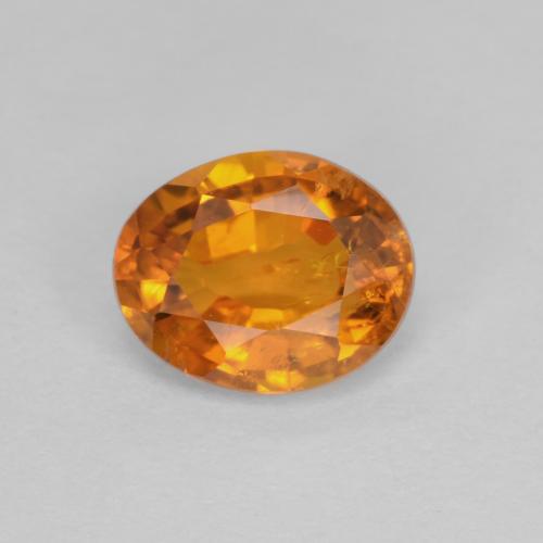 Clinohumita naranja natural de 0,91 ct, corte óvalo, SI