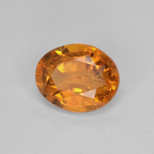 Clinohumita naranja natural de 0,91 ct, corte óvalo, SI