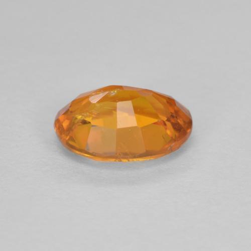Clinohumita naranja natural de 0,91 ct, corte óvalo, SI