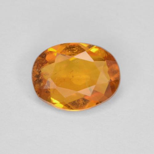 Clinohumite Marrón naranja natural de 0.65 ct, Corte Óvalo, SI
