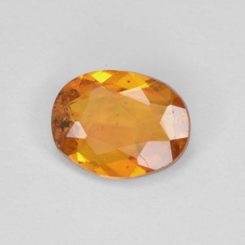 Clinohumite Marrón naranja natural de 0.65 ct, Corte Óvalo, SI