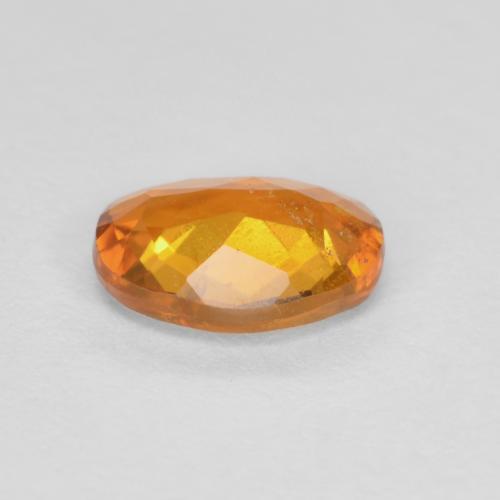 Clinohumite Marrón naranja natural de 0.65 ct, Corte Óvalo, SI