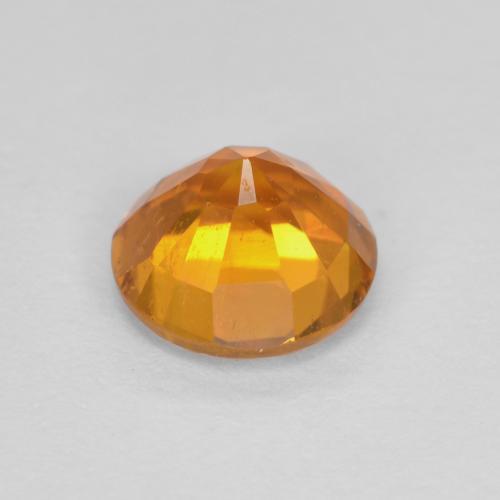Clinohumite Naranja medio natural de 0.91 ct, Corte Redondo, SI