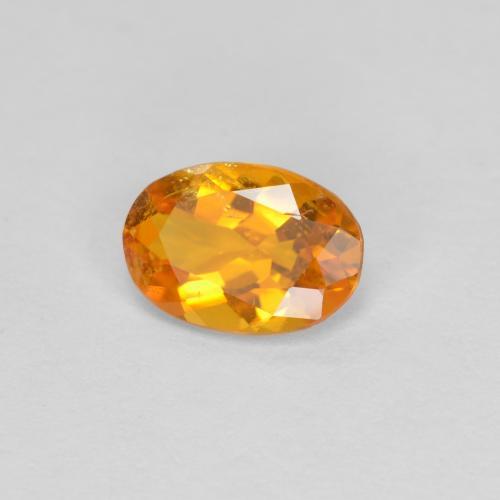 Clinohumite Naranja albaricoque natural de 0.60 ct, Corte Óvalo, SI