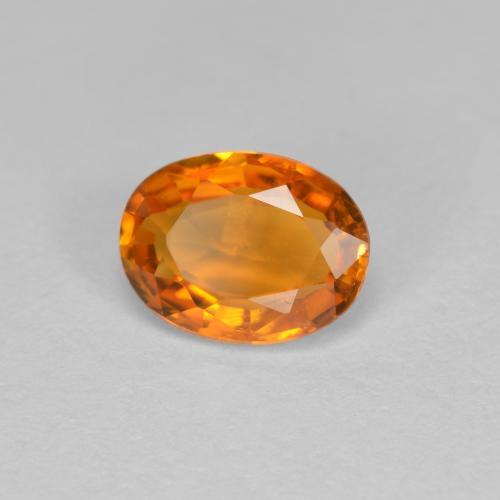 Clinohumite Naranja medio natural de 0.81 ct, Corte Óvalo, VS-SI
