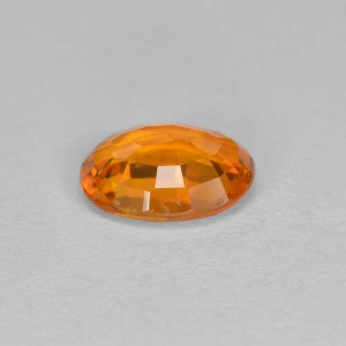 Clinohumite Naranja medio natural de 0.81 ct, Corte Óvalo, VS-SI