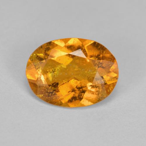 Clinohumita naranja natural de 1,43 ct, corte óvalo, SI