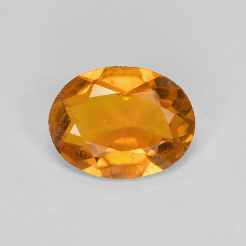 Clinohumita naranja natural de 1,34 ct, corte óvalo, SI