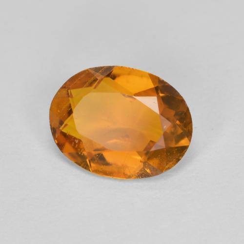 Clinohumita naranja natural de 1,34 ct, corte óvalo, SI