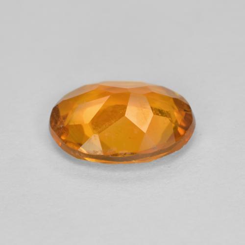 Clinohumita naranja natural de 1,34 ct, corte óvalo, SI