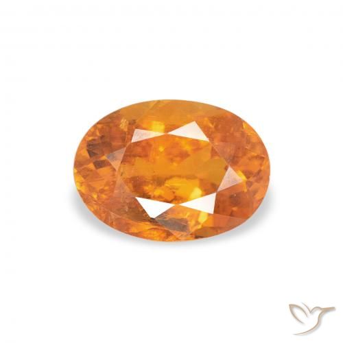 0.86ct Natural Naranja claro Clinohumite, Ovalada, SI-I1
