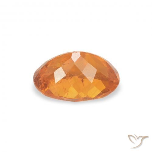 Clinohumite Naranja claro natural de 0.86 ct, Ovalada, SI-I1