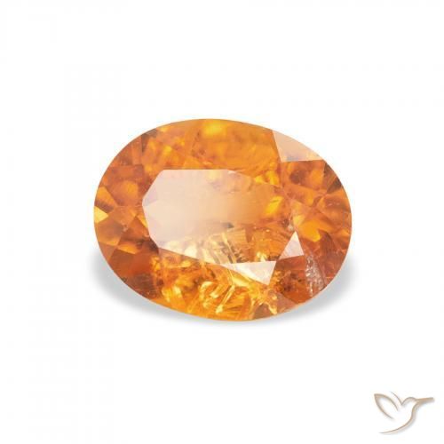 Clinohumite Naranja medio natural de 1.29 ct, Ovalada, SI-I1