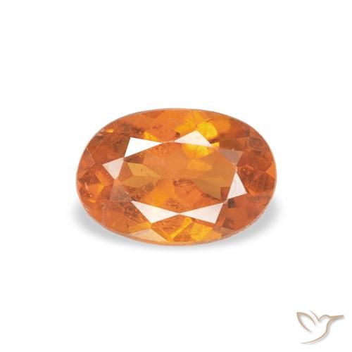 0.57ct Natural Naranja medio Clinohumite, Ovalada, SI