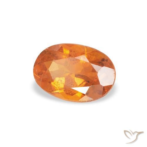Clinohumite Naranja medio natural de 0.57 ct, Ovalada, SI