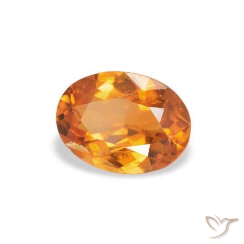 Clinohumite Naranja albaricoque natural de 0.70 ct, Ovalada, SI