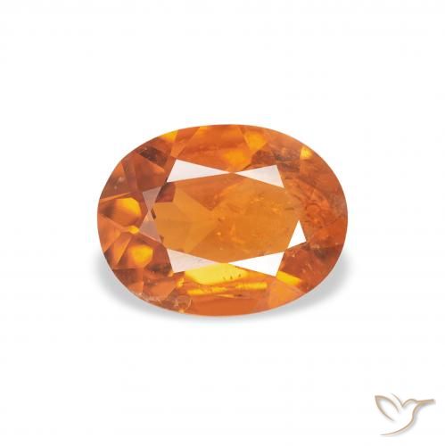 1.04ct Natural Ámbar naranja Clinohumite, Ovalada, SI