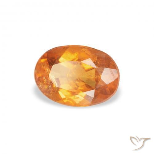 Clinohumite Naranja rojizo natural de 0.76 ct, Ovalada, SI