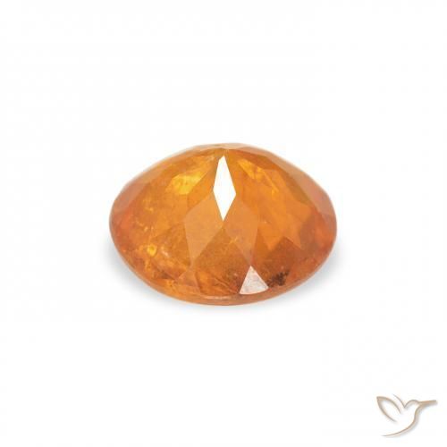 Clinohumite Naranja rojizo natural de 0.61 ct, Redondo, SI