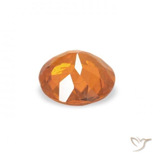 Clinohumite Naranja rojizo natural de 0.43 ct, Redondo, SI