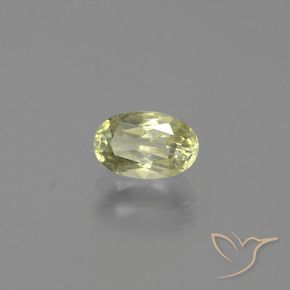 Diásporo con Cambio de Color Verde amarillo natural de 0.79 ct, Ovalada, VS