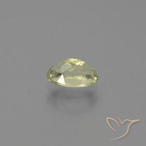 Diásporo con Cambio de Color Verde amarillo natural de 0.79 ct, Ovalada, VS