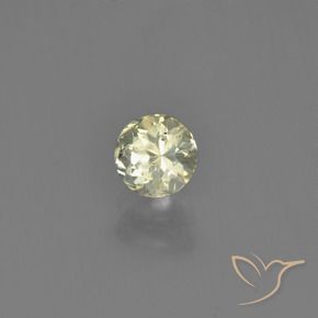 Diasporo con cambio de color amarillo natural de 0,61 ct, corte redondo, VS