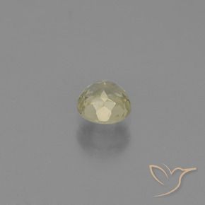 Diasporo con cambio de color amarillo natural de 0,60 ct, corte redondo, VS