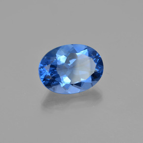 Fluorita con cambio de color azul violeta natural de 20,98 ct, corte óvalo, VS