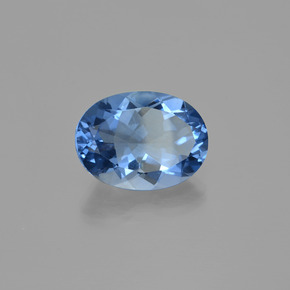 Fluorita que cambia de color Violeta a azul natural de 20.45 ct, Corte Óvalo, VS