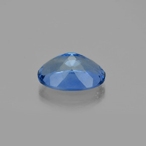 Fluorita que cambia de color Violeta a azul natural de 20.45 ct, Corte Óvalo, VS