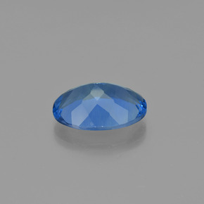 Fluorita que cambia de color Azul marino intenso natural de 18.43 ct, Corte Óvalo, VS