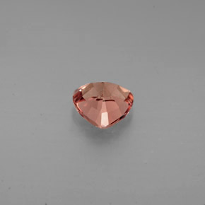 Granate que cambia de color rosado / rojo naranja natural de 0.88 ct, Trillón, VS
