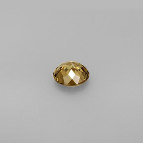 Granate que cambia de color Marrón a rosado rojizo verdoso natural de 0.92 ct, Corte Redondo, VVS-VS