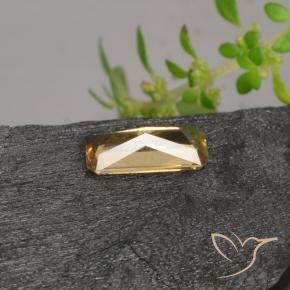 Granate que cambia de color Marrón-oro natural de 0.63 ct, Corte Octágono / Esmeralda, VS