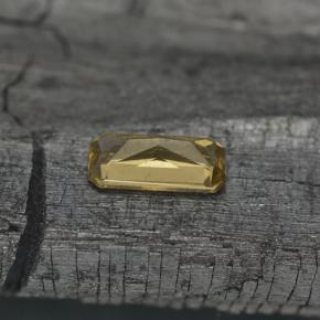Granate que cambia de color Marrón-oro natural de 0.68 ct, corte esmeralda, VVS-VS