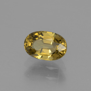 Granate que cambia de color Marrón/naranja verdoso natural de 0.72 ct, Corte Óvalo, VVS