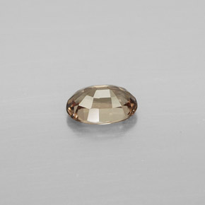 Granate que cambia de color Marrón claro natural de 0.62 ct, Corte Óvalo, VVS-VS
