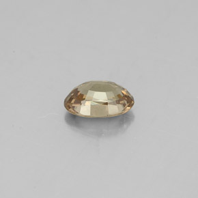 Granate con cambio de color amarillo natural de 0,62 ct, corte óvalo, VS