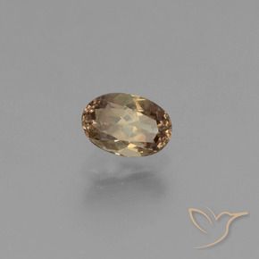 Granate que cambia de color Marrón claro natural de 0.57 ct, Ovalada, VVS-VS