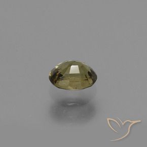 Granate con cambio de color amarillo natural de 0,65 ct, corte óvalo, VS