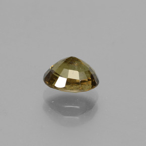 Granate que cambia de color Dorado verdoso natural de 1.34 ct, Corte Óvalo, VS-SI