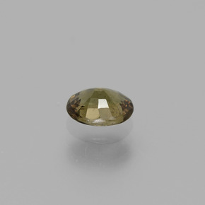 Granate con cambio de color marrón natural de 0,77 ct, corte óvalo, VS