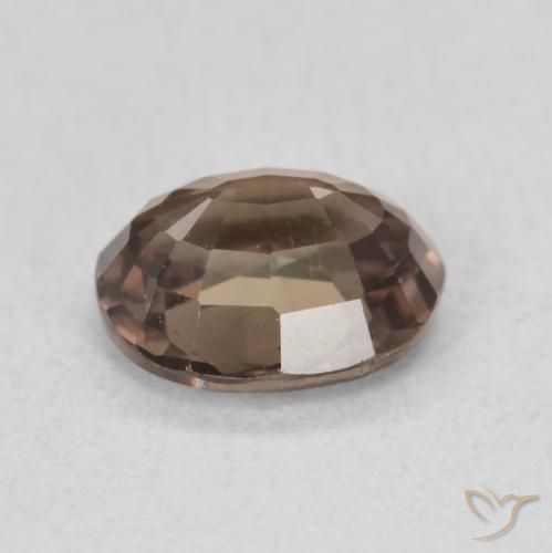 Granate que cambia de color Marrón claro medio natural de 1.23 ct, Ovalada, VS