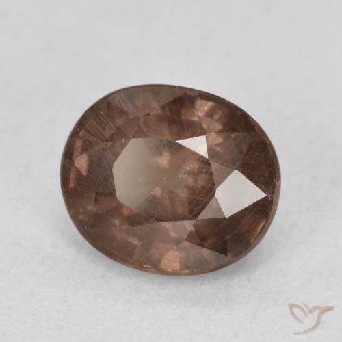 Granate que cambia de color Marrón claro medio natural de 1.44 ct, Ovalada, VS