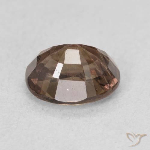Granate que cambia de color Marrón claro medio natural de 1.29 ct, Ovalada, VS