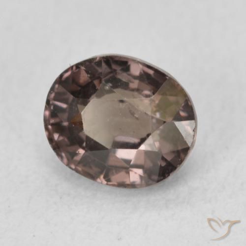 Granate que cambia de color Marrón oscuro natural de 1.36 ct, Ovalada, VS