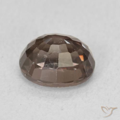 Granate que cambia de color Marrón oscuro natural de 1.36 ct, Ovalada, VS