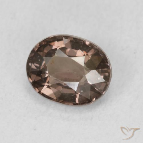 Granate que cambia de color Marrón oscuro natural de 0.97 ct, Ovalada, VS